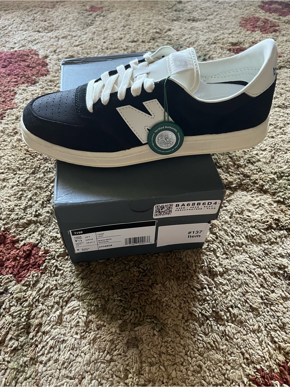 Stock x verified New Balance Men’s Black and White Low-Top Sneakers